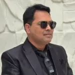 Dr Arvind Aher